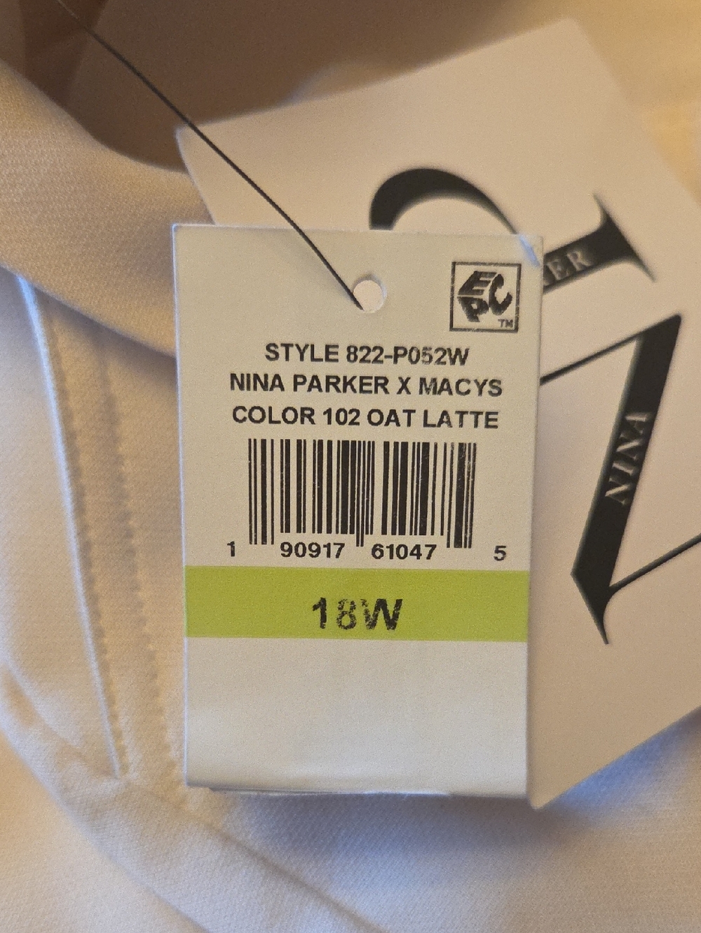 Wide Legged Ivory Colored Pants.